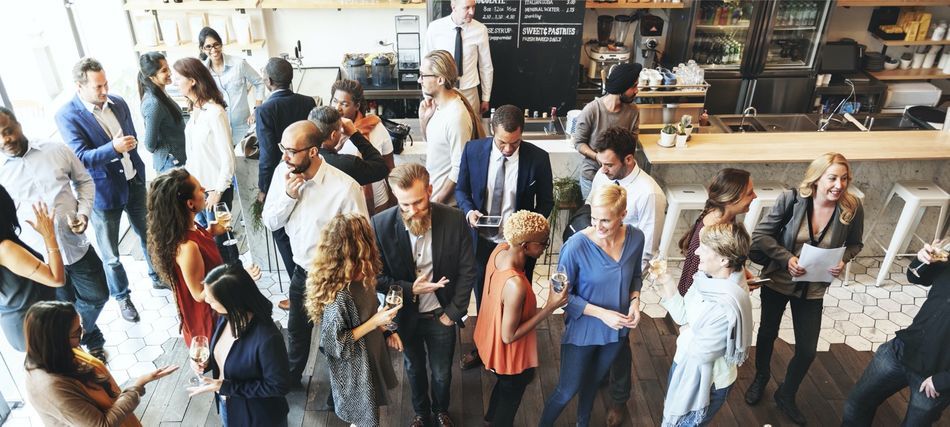 0 - People networking at an event that's obviously not staged.jpeg